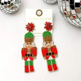 Beaded Nutcracker Earrings with Red Crystal Posts in Red and Green